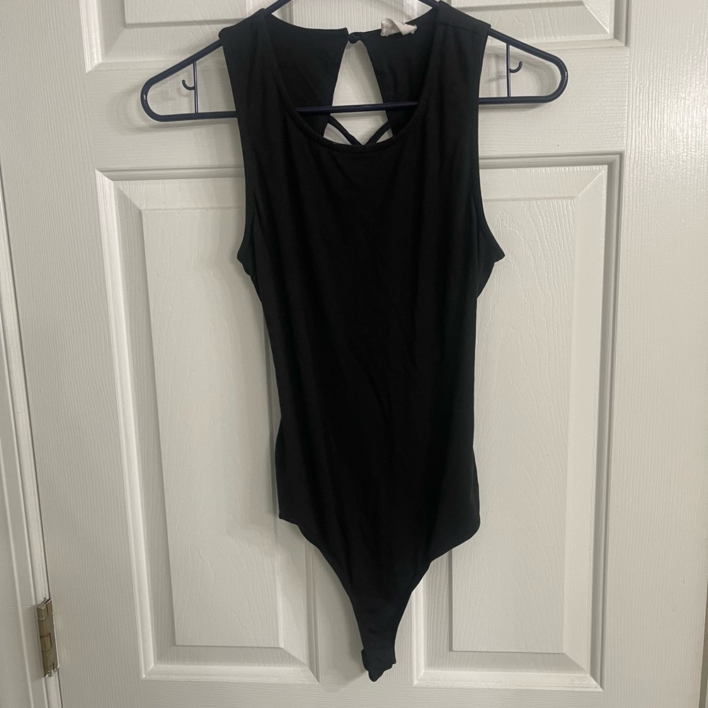 Black body suit, cut out back